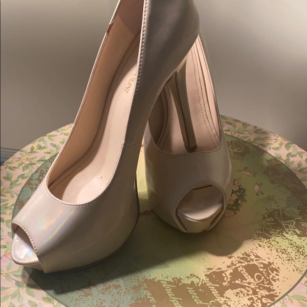 Nude color pumps